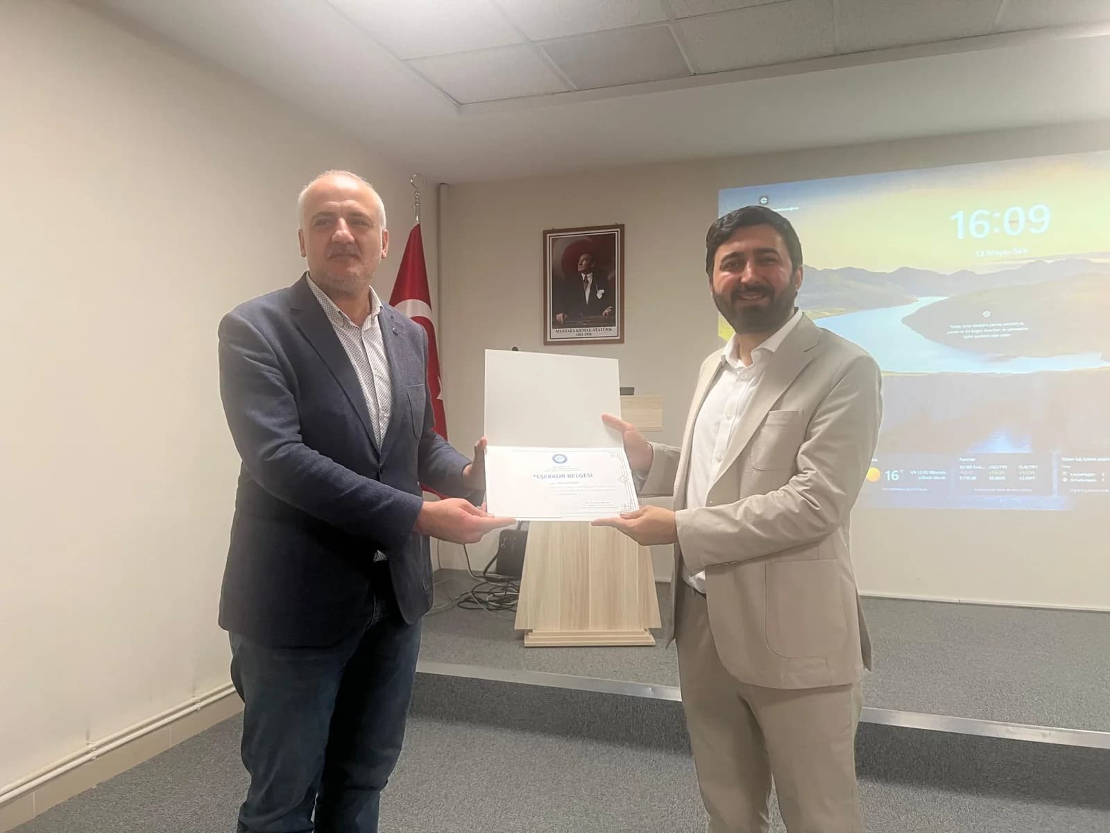 Certificate presentation after the Gazi University seminar